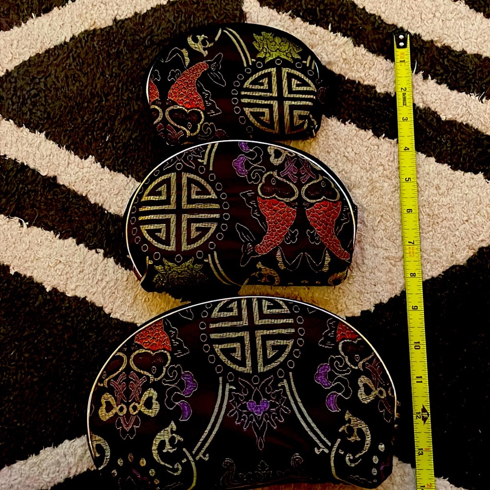 Three cosmetic/jewelry cases